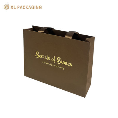 Buy Custom Kraft Paper Shopping Bag with Gold Foil Logo Printing and Reinforced Construction for Jewelry Packaging online manufacture