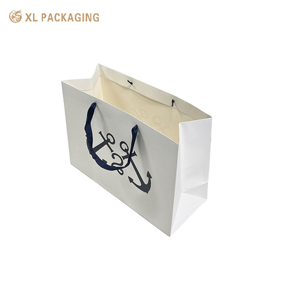 Buy White Paper Packaging Bags Gold Foil Kraft Paper Clothes Shoes Shopping Bag With Handle online manufacture