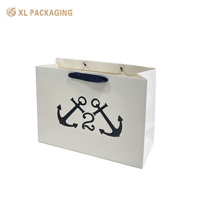 Buy Custom Matte Black Clothing Paper Bags with Reinforced Construction and Full-Surface Logo Printing for Luxury Gift Packaging online manufacture