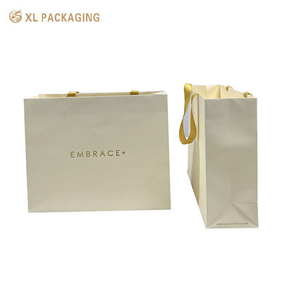 Buy Custom Eco-Friendly Paper Bags for Clothing & Gift Packaging online manufacture