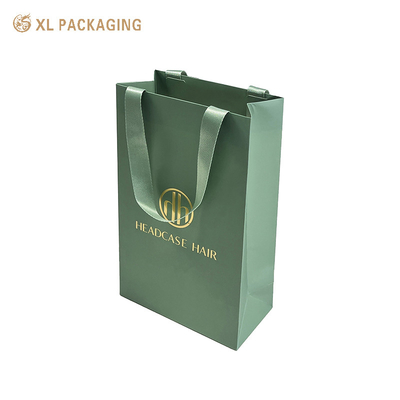 Buy XL Packaging Custom Packaging Factory Custom Design Printed Shopping Gift Packaging Paper Bag With Your Own Logo Luxury Green Ribbon Thick Paper Bag For Clothes online manufacture