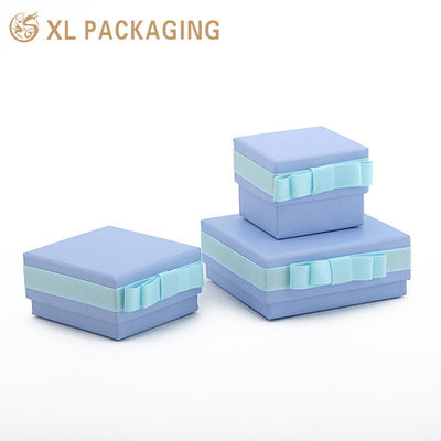 Buy Small Rigid Ring Gift Box with 1000gsm Paperboard, Light Blue Ribbon Bow & Multi-Slot Sponge Insert for Jewelry Packaging online manufacture