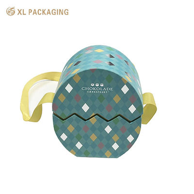 Buy Handmade Easter Egg Chocolate Gift Box Custom Embossed Silver Logo With Ribbon Decor Packaging Box online manufacture