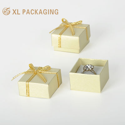Buy Custom 800g Rigid Jewelry Gift Box with White Velvet Insert and Gold-Edge Ribbon Bow for Rings online manufacture