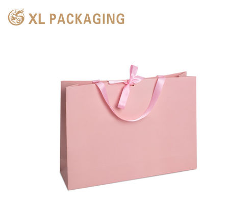 Luxury Pink Custom Logo Gift Bag with Premium Matte Paperboard and Gold Foil Stamping for Boutique Packaging